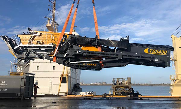 Tracked vehicle being shipped to the Caribbean
