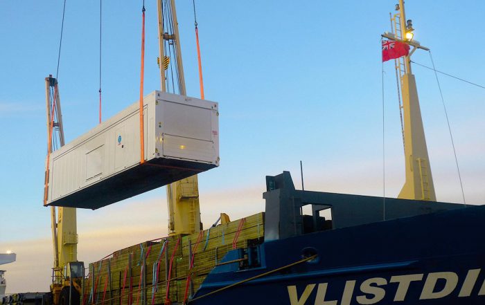 Mobile medical units being loaded on ship bound for Guyana